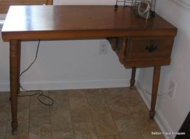 There are two matching tables like this from mid century.