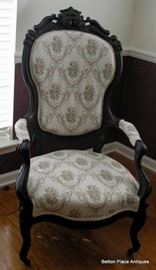 Another Victorian Parlor Chair with Decorative Carving at top.