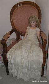 Antique Doll in Normal Size Ladies Victorian  Parlor Chair  This is a Simon & Halbig German Antique Doll