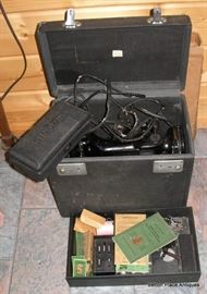 Singer Featherlite 221 Sewing Machine in case with accessories, cord is destroyed and would have to be replaced.