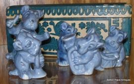Cute as heck little pottery dogs