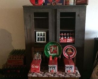 Coca Cola Items and Black/ Gray Country Cooling Cupboard