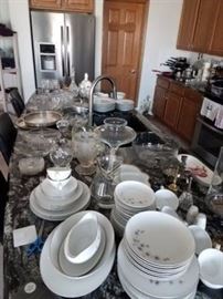 All sorts of china, dishes, and kitchen utensils in perfect condition