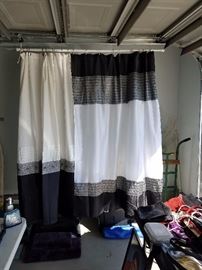Shower curtain and bathroom amenities