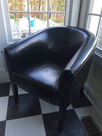 One of a set of four club chairs.