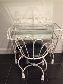 Glass top and metal vanity.