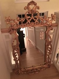 Carved gold frame mirror.