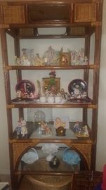 Rattan Shelving Unit & Figurines.  White Set on 2nd Shelf is a vintage Chocolate Pot & Tray Set. Rattan Shelving Unit is in beautiful condition