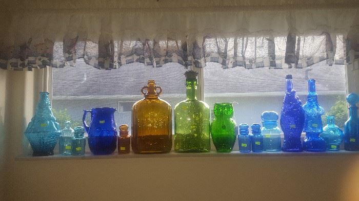 Colored Glass Pitchers, bottles.  Green Owl is a Pitcher and one beside it is a large rare Royall Lyme bottle with Lid