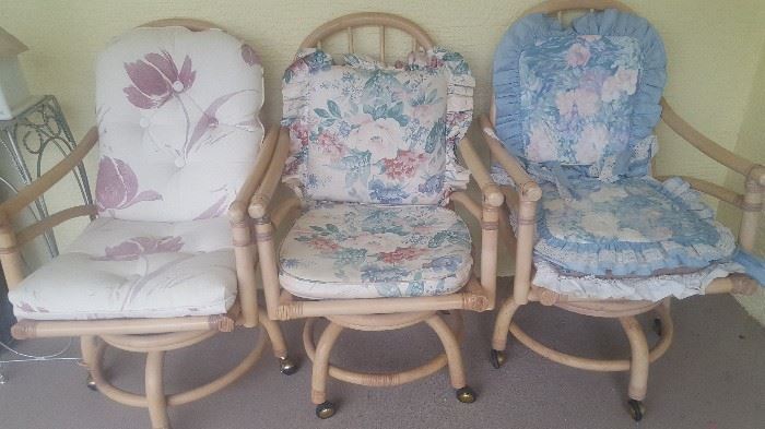 3 Rattan Chairs with Rollers.