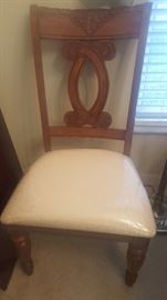 Side Chair.  Another, the same style is also available but has arms.  Seats are covered so they are in great shape