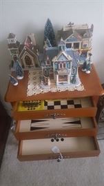 Game Cabinet.  Each drawer has a different game table & is great for storage items or pieces. More Christmas Village Houses