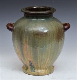 Fulper Art Pottery Vase	
with double handles
12" high
early 20th century    Bid on-line November 10th -15th at www.fairfieldauction.com