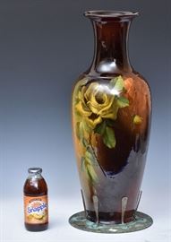 Monumental Rookwood Standard Glaze Vase	
with Tiffany Studios mount
24" high, 9 1/4" diameter
signed H. Mitchell    Bid on-line November 10th -15th at www.fairfieldauction.com