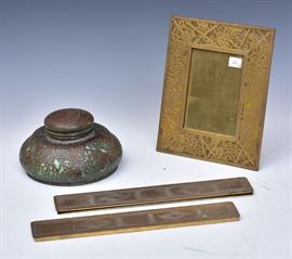Tiffany Studios Desk Set Pieces
Grape Vine Frame, 9 1/4" x 7 1/2",
Grapevine inkwell, 7" diameter and
a pair of Graduate blotters
early 20th century    Bid on-line November 10th -15th at www.fairfieldauction.com