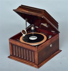 Pathe Phonograph	
with convertible reproducer
17" wide x 13 1/2" high x 18 1/2" deep
early 20th century     Bid on-line November 10th -15th at www.fairfieldauction.com