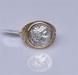 14k Gold Coin Ring
ring size 11, 11.3 dwt    Bid on-line November 10th -15th at www.fairfieldauction.com
