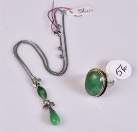 Chinese Carved Jade 14k Gold Pendant
with diamond accents, 2 1/2" long
on an 18k gold chain, 28" long 
together with a 14k gold carved jade
Bid on-line November 10th -15th at www.fairfieldauction.com