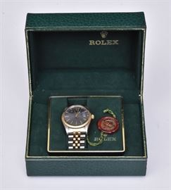 Rolex Oyster Perpetual Gent's Wrist Watch	
two tone
6 1/2" bracelet with extra links
serial #8240xxx
with original box
late 20th century   Bid on-line November 10th -15th at www.fairfieldauction.com