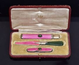 Dreyfous Enamel and Jade Boxed Letter Set
consisting of pencil, letter opener
and pocket knife
5 1/4" x 3" box
early 20th century   Bid on-line November 10th -15th at www.fairfieldauction.com