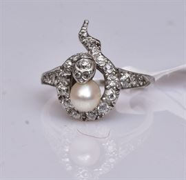 Victorian Diamond and Pearl Snake Ring
the shank is 24k gold with a platinum
and 14k rose gold mount
ring size 5 3/4, 4.0 dwt gross    Bid on-line November 10th -15th at www.fairfieldauction.com