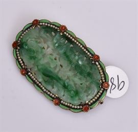 Art Deco 14k Gold Carved Jade Brooch
with enameled frame
2 1/4" long, 9.9 dwt gross    Bid on-line November 10th -15th at www.fairfieldauction.com