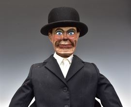 Ventriloquist Puppet	
carved wood with glass eyes
41" long
early 20th century   Bid on-line November 10th -15th at www.fairfieldauction.com