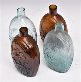 Four Sheppard Historical Flasks
with eagle, each 6 1/2" high
Zanesville, Ohio
mid-19th century    Bid on-line November 10th -15th at www.fairfieldauction.com