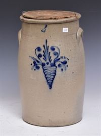 Stoneware Churn
4 gallon, 15 3/4" high
with wooden top, decorated with
cobalt blue cornucopia 
19th century    Bid on-line November 10th -15th at www.fairfieldauction.com