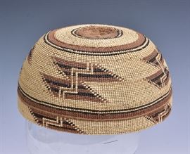 Hupa Native American Basketry Hat	
7" diameter
early 20th century    Bid on-line November 10th -15th at www.fairfieldauction.com
