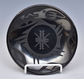 San Ildefonso Blackware Plate
Maria Martinez and Popovi Da
6 1/2" diameter
dated 7/64    Bid on-line November 10th -15th at www.fairfieldauction.com