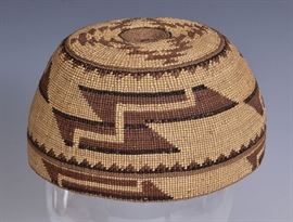 Hupa Native American Basketry Hat
6 1/2" diameter
early 20th century    Bid on-line November 10th -15th at www.fairfieldauction.com