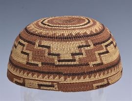 Hupa Native American Basketry Hat	
7" diameter
early 20th century   Bid on-line November 10th -15th at www.fairfieldauction.com