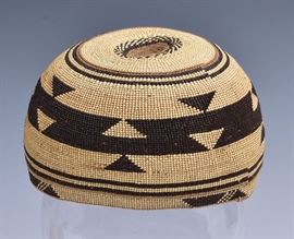 Hupa Native American Basketry Hat	
6 1/2" diameter
early 20th century    Bid on-line November 10th -15th at www.fairfieldauction.com