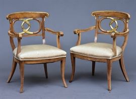 Pair of Walnut Baltic Arm Chairs
parcel gilt with dolphin motif
22 1/2" x 19", 34" high
early 19th century    Bid on-line November 10th -15th at www.fairfieldauction.com