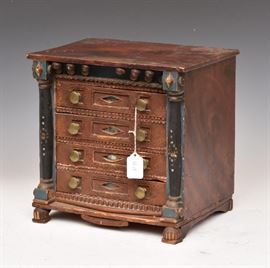 Continental Grain Painted Jewelry Box
in the form of a miniature chest
with mirrored panels and fitted drawers
12" x 9", 11 1/2" high
19th century    Bid on-line November 10th -15th at www.fairfieldauction.com
