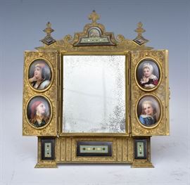 Bronze Enameled Table Mirror	
four painted oval portraits
7" wide, 9" high
French or Russian    Bid on-line November 10th -15th at www.fairfieldauction.com