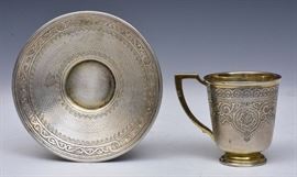 	Russian Chased Silver Cup and Saucer
with mark of Mikhail Ovchinnikov
5" diameter, 3" high
8.7 troy ounces    Bid on-line November 10th -15th at www.fairfieldauction.com