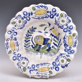Continental Faience Charger	
with standing lion
13 1/4" diameter
18th/19th century    Bid on-line November 10th -15th at www.fairfieldauction.com