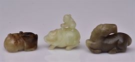 Three Chinese Jade Carvings
including horse, dog and
figure riding water buffalo
the largest 2 3/8" long    Bid on-line November 10th -15th at www.fairfieldauction.com