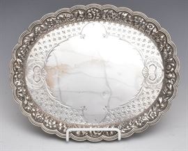 Tiffany & Co. Sterling Silver Salver
with repousse floral border
11" x 8 3/4" x 1"
18.8 troy ounces
early 20th century   Bid on-line November 10th -15th at www.fairfieldauction.com