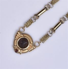 14k Gold Ancient Coin Necklace	
20" long together with 14k gold
Ancient coin earrings, 1" diameter
43.8 dwt gross    Bid on-line November 10th -15th at www.fairfieldauction.com