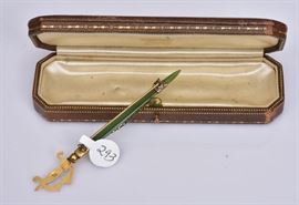 Antique English 9k Gold Jade Brooch
in the form of a sword, 4 1/4" long
4.3 dwt gross    Bid on-line November 10th -15th at www.fairfieldauction.com
