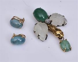 14k Gold and Silver Lion Head Brooch
with carved rock crystal leaves
2 1/2" long together with a pair
of 14k gold blue topaz pierced earrings    Bid on-line November 10th -15th at www.fairfieldauction.com