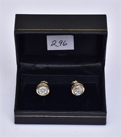 14k Gold Diamond Earrings
each 1/4" diameter earring set 
with 9 diamonds, pierced
2.8 dwt gross    Bid on-line November 10th -15th at www.fairfieldauction.com