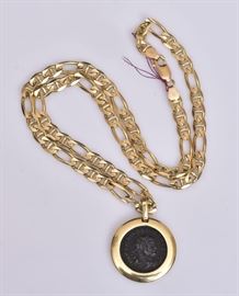 14k Gold Ancient Coin Pendant	
1 1/8" diameter on a
20" long 14k gold chain
26.6 dwt gross    Bid on-line November 10th -15th at www.fairfieldauction.com
