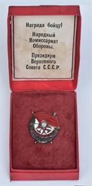 Identified Soviet Order of the Red Banner Medal	
War with Finland, 1940
40mm high
together with recipient's identification    Bid on-line November 10th -15th at www.fairfieldauction.com