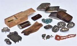 Group of Jewelry and Accessories	
including lion belt mounts, Navajo
turquoise bracelet, four purses,
dolls gloves, and eye glasses