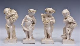 Italian Set of Four Glazed Putti Figures	
6" high
18th/19th century
