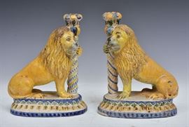 Pair of Italian Faience Lion Candlesticks
each with his paw resting on a column
9 1/2" high
18th/19th century